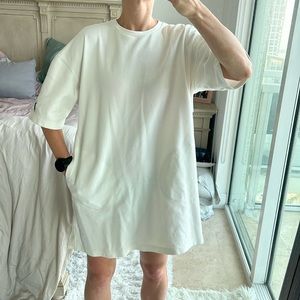 Nike size large white dress with pockets and mesh side and vented back